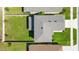 Aerial view showcases the home's roof and lawn at 454 Sunfish Dr, Winter Haven, FL 33881