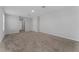 Expansive room featuring carpeted floors, recessed lighting, and versatile space at 454 Sunfish Dr, Winter Haven, FL 33881