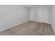 A bright bedroom features two closets, carpeted floors, neutral walls and lots of light at 454 Sunfish Dr, Winter Haven, FL 33881