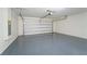 This garage includes an automatic garage door opener and an electrical panel at 454 Sunfish Dr, Winter Haven, FL 33881