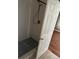 Walk-in shower with white tiles and a rain shower head at 506 Myakka Pl, Kissimmee, FL 34759