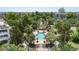 Stunning community pool area with lush landscaping and charming gazebo at 7848 Somersworth Dr, Kissimmee, FL 34747