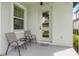 Rear patio with seating area at 7848 Somersworth Dr, Kissimmee, FL 34747