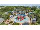 Resort-style water park featuring pools, slides, and ample lounge seating under palm trees at 7848 Somersworth Dr, Kissimmee, FL 34747