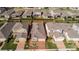 Aerial view of home's layout with brick driveway and walkway outlined in red at 1456 Sourwood Dr, Ocoee, FL 34761
