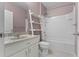 Clean bathroom featuring a tub, shower, toilet, and vanity at 1940 Banner Ln, St Cloud, FL 34769