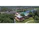 Aerial of community clubhouse, pool, playground, and landscaping. Perfect for an active lifestyle at 1940 Banner Ln, St Cloud, FL 34769
