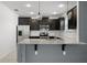 Updated kitchen with stainless steel appliances, granite countertops and modern cabinets at 1940 Banner Ln, St Cloud, FL 34769