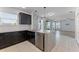 Spacious kitchen with granite countertops, stainless steel appliances, and an open layout at 1940 Banner Ln, St Cloud, FL 34769