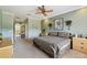 Bedroom featuring neutral walls with access to a large bathroom at 324 Sorrento Rd, Poinciana, FL 34759
