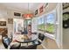 Bright breakfast nook with window overlooking the outdoor area and lots of natural light at 324 Sorrento Rd, Poinciana, FL 34759