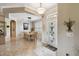 Inviting dining room features tile flooring and a stylish light fixture at 324 Sorrento Rd, Poinciana, FL 34759