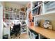 Well-organized office space with built-in shelves, a desk, and plenty of storage at 324 Sorrento Rd, Poinciana, FL 34759