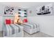 Delightful bedroom offers nautical accents and twin beds at 8937 Amelia Downs Trl, Kissimmee, FL 34747
