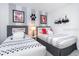 Unique bedroom features twin beds and playful dog-themed accents at 8937 Amelia Downs Trl, Kissimmee, FL 34747