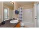 Bathroom with tub and shower, vanity and toilet at 2005 Royal Ridge Dr, Davenport, FL 33896