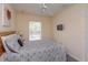 Cozy bedroom with a double bed and window at 2005 Royal Ridge Dr, Davenport, FL 33896
