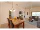 Open floor plan boasts a spacious living room, dining area, and view into the kitchen at 2005 Royal Ridge Dr, Davenport, FL 33896