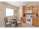 Cozy kitchen nook with glass table and chairs at 2005 Royal Ridge Dr, Davenport, FL 33896