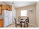 Kitchen nook with glass-top table and four chairs at 2005 Royal Ridge Dr, Davenport, FL 33896