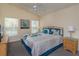 Large main bedroom with a king-size bed and plenty of natural light at 2005 Royal Ridge Dr, Davenport, FL 33896