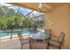 Inviting pool area with patio furniture at 2005 Royal Ridge Dr, Davenport, FL 33896