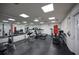 On-site gym offers modern exercise equipment, free weights, and a mirrored wall, creating an ideal workout environment at 4331 Valencia Dr, Indian Lake Estates, FL 33855