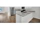 Clean kitchen featuring granite countertops, stainless appliances, and an open layout at 4711 Sw 136Th Pl, Ocala, FL 34473