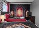 Comfortable bedroom featuring two beds, a custom Harry Potter themed mural wall, and soft lighting fixtures at 2901 Protagonist St, Kissimmee, FL 34746