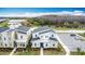 Stylish two-story home with a modern design, stone detailing, parking, and beautiful landscaping at 2901 Protagonist St, Kissimmee, FL 34746