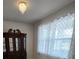 Bright bedroom featuring a stylish ceiling fan and patterned curtains at 2659 Park Ridge St, Apopka, FL 32712