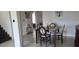 Elegant dining room featuring classic furniture, stylish decor, and seamless flow throughout the home at 2659 Park Ridge St, Apopka, FL 32712