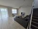 Cozy living room with comfortable seating, and easy access to the backyard at 2659 Park Ridge St, Apopka, FL 32712