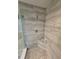 This spa-like bathroom features a stand up shower with tile surround and glass door at 2659 Park Ridge St, Apopka, FL 32712