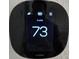 Close up of an Ecobee Smart Thermostat showing 73 degrees and 60% humidity at 2659 Park Ridge St, Apopka, FL 32712