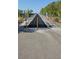Access ramp of a community bridge equipped with railings for safety and accessibility at 432 Diamond Dove Cv, Winter Springs, FL 32708