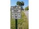 Traffic pattern community bridge sign instructing cyclists and pedestrians at 432 Diamond Dove Cv, Winter Springs, FL 32708