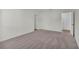 Spacious bedroom with neutral carpeting, white walls, and ample natural light at 2722 Sw 151St Pl, Ocala, FL 34473