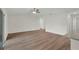 Spacious living room features wood flooring and neutral walls, creating a bright, open feel at 2722 Sw 151St Pl, Ocala, FL 34473