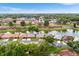 Wide view of lakefront community with many homes at 565 Lake Mystic Ln, Lakeland, FL 33813