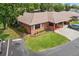 Brick home with carport and landscaped lawn at 565 Lake Mystic Ln, Lakeland, FL 33813