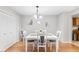 Bright dining room with modern table and chairs at 565 Lake Mystic Ln, Lakeland, FL 33813
