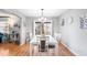 Spacious dining area with white table and six chairs at 565 Lake Mystic Ln, Lakeland, FL 33813