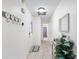 Hallway with tile floors and coat rack at 565 Lake Mystic Ln, Lakeland, FL 33813