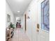 Bright entryway with tile flooring and stained glass door at 565 Lake Mystic Ln, Lakeland, FL 33813