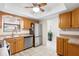 Kitchen with stainless steel appliances and wood cabinets at 565 Lake Mystic Ln, Lakeland, FL 33813
