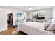 Main bedroom with large bed, walk-in closet, and workspace at 565 Lake Mystic Ln, Lakeland, FL 33813