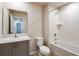 Clean bathroom with a bathtub, toilet, and vanity with sink at 2036 Marigold Aly, Winter Haven, FL 33884