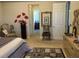 Bedroom with elegant furnishings and a decorative chair at 8339 Bridgeport Bay Cir, Mount Dora, FL 32757