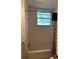 Modest full bathroom with standard tub/shower combo and tiled walls at 1219 Dixie Dr, Auburndale, FL 33823